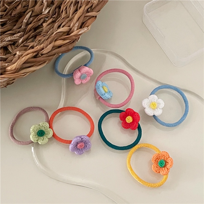 Hộp 7 chiếc cột tóc hoa nhựa nhiều màu cho bé