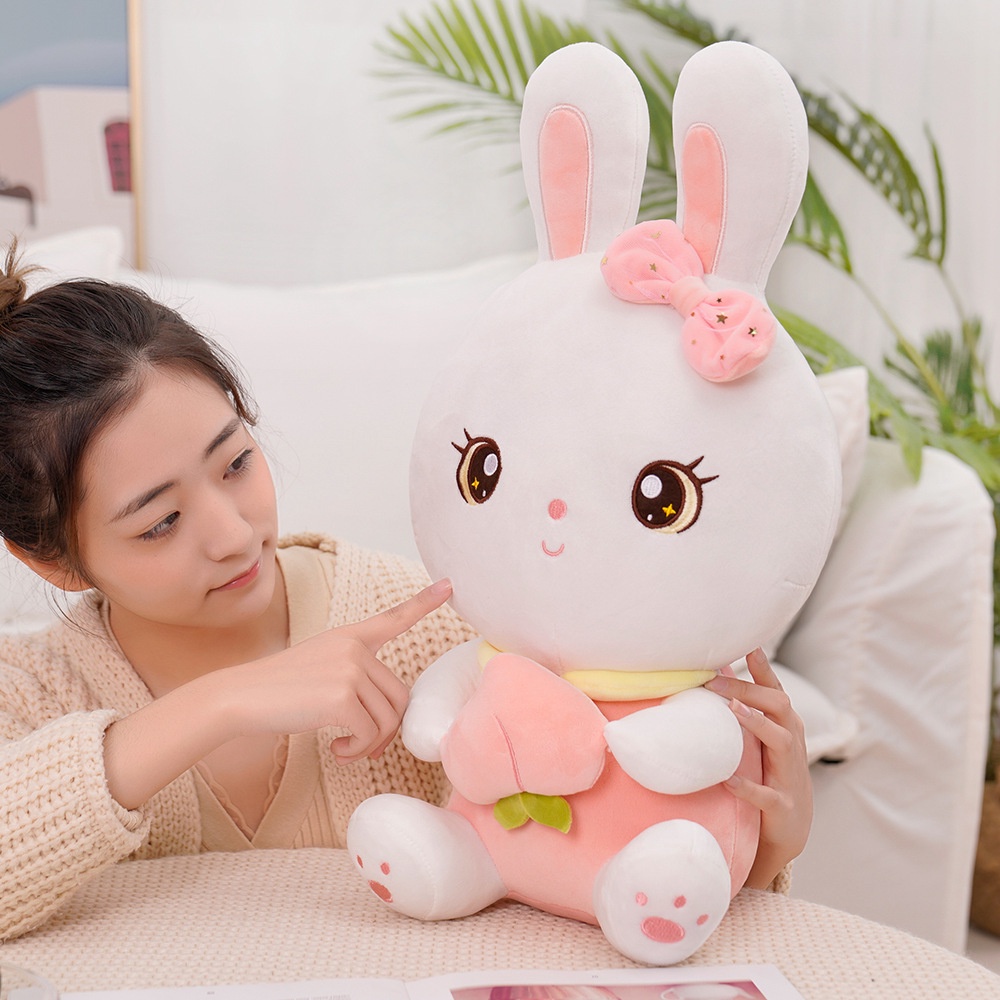 CÓ SẴNGấu bông thỏ trắng ôm đào dễ thương kích thước 40-55cm