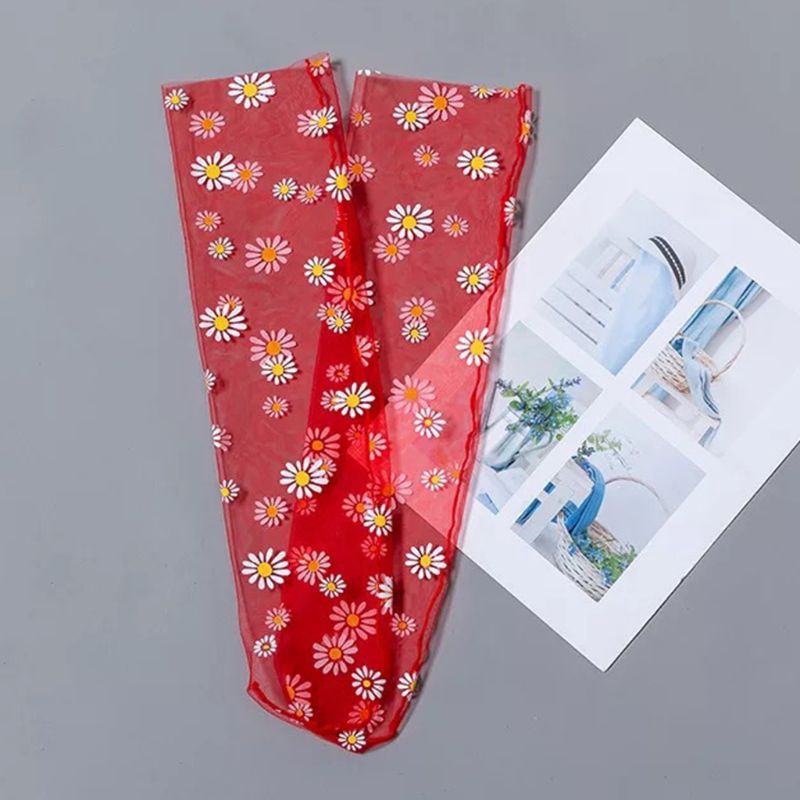 Đôi vớ lưới rộng trong suốt in hình hoa cúc dành cho nữ