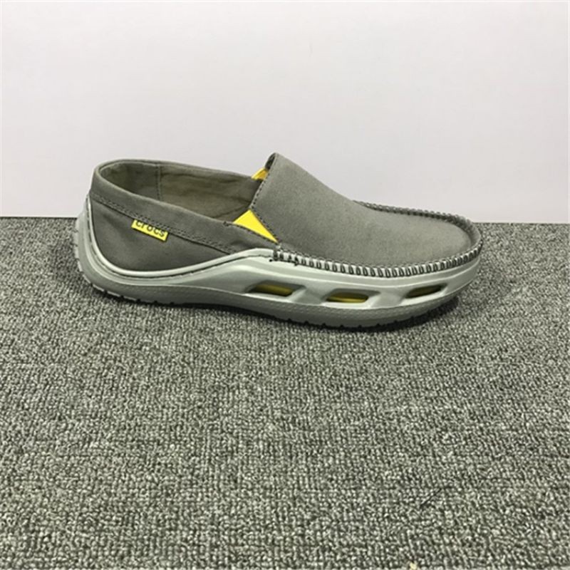 GIÀY  LƯỜI VẢI  CROSS TIDELINE SLIP ON CHO NAM MÀU XÁM