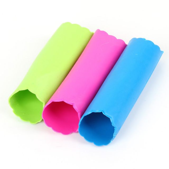 Dụng cụ lột vỏ tỏi bằng tay,,,