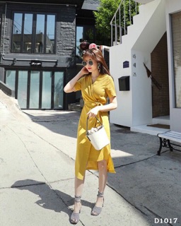 Đầm vàng cột eo