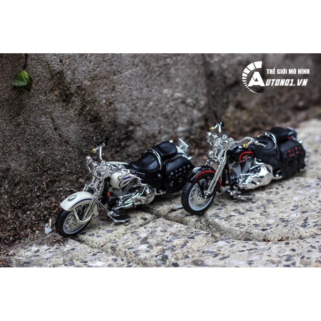 MÔ HÌNH HARLEY DAVIDSON 1998 FLSTS HERITAGE SPRINGER 1:18 MAISTO 3614