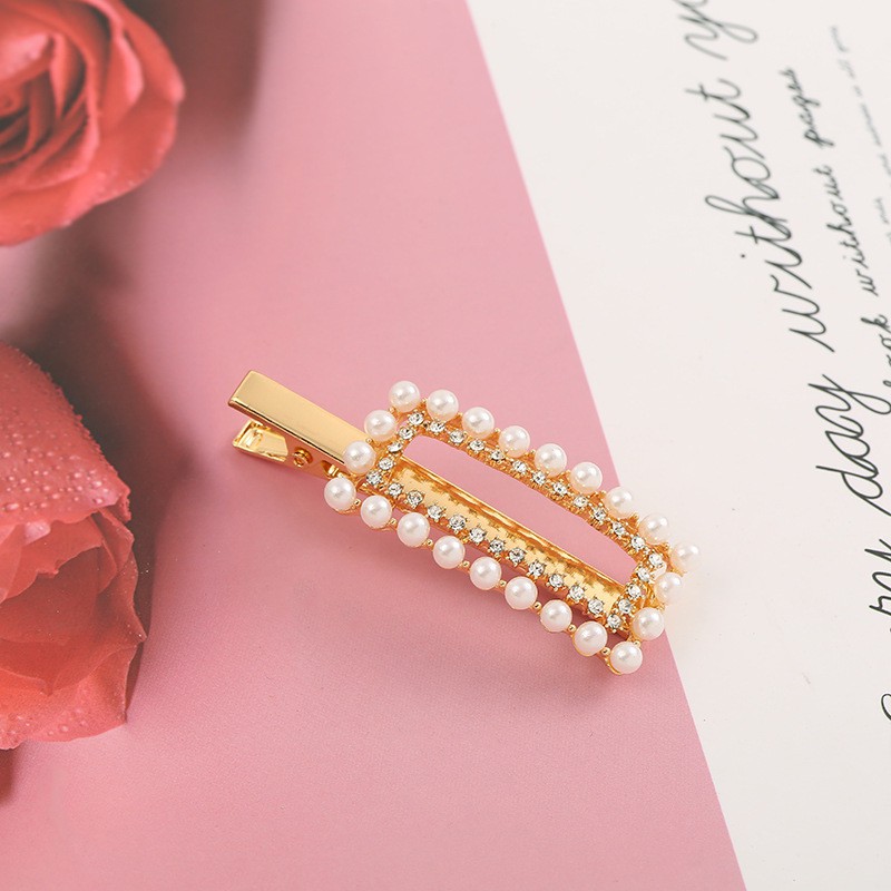 Kẹp tóc ngọc trai giả dễ thương cho bé gái