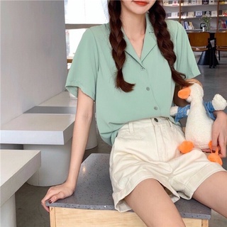 Áo sơ mi nam nữ màu xanh, thiết kế thời trang, trẻ trung và năng động.