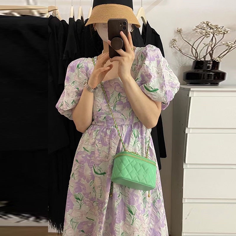 Đầm hoa dáng dài tay bồng màu loang nhạt hở lưng mùa hè 2022