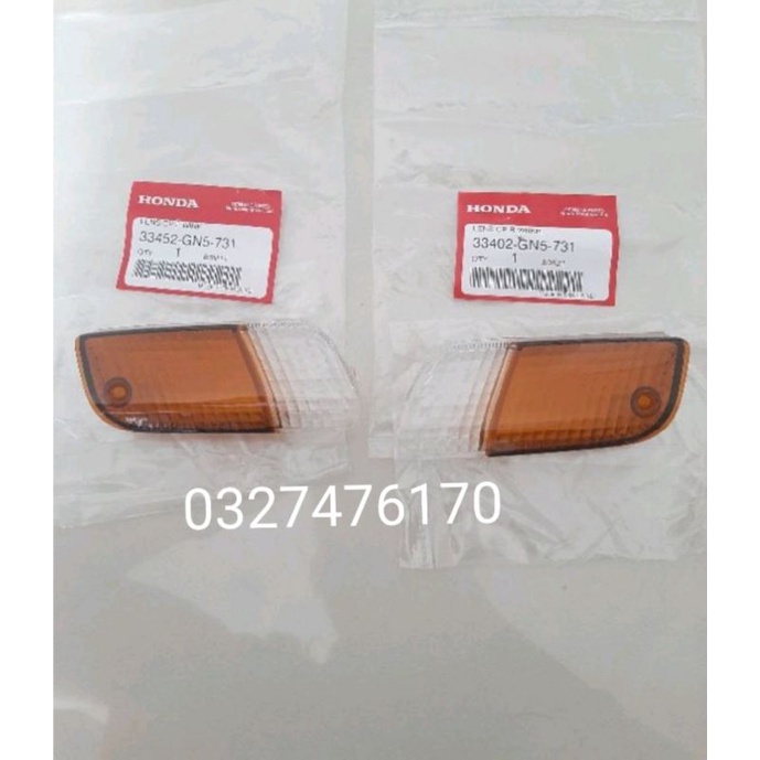 Cặp nắp chụp võ đèn xi nhan trước xe DREAM lùn zin honda thái