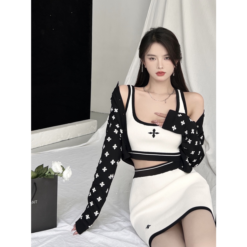 Porozi  Set đồ  gồm áo hai dây dáng ngắn + chân váy lưng thun thời trang cá tính cho nữ