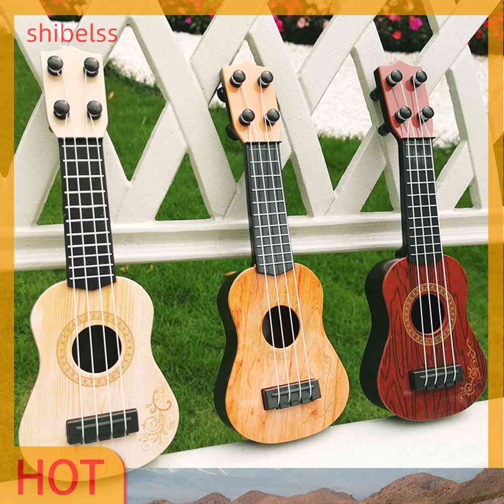Đồ Chơi Đàn Ghita 4 Dây Mini Cho Bé