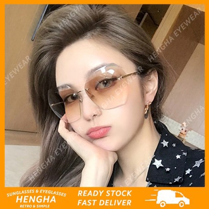 Kính râm nữ oversize tròng vuông không viền