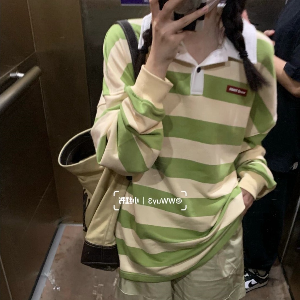 Áo thun tay dài dáng rộng họa tiết sọc ngang thời trang dành cho nữ