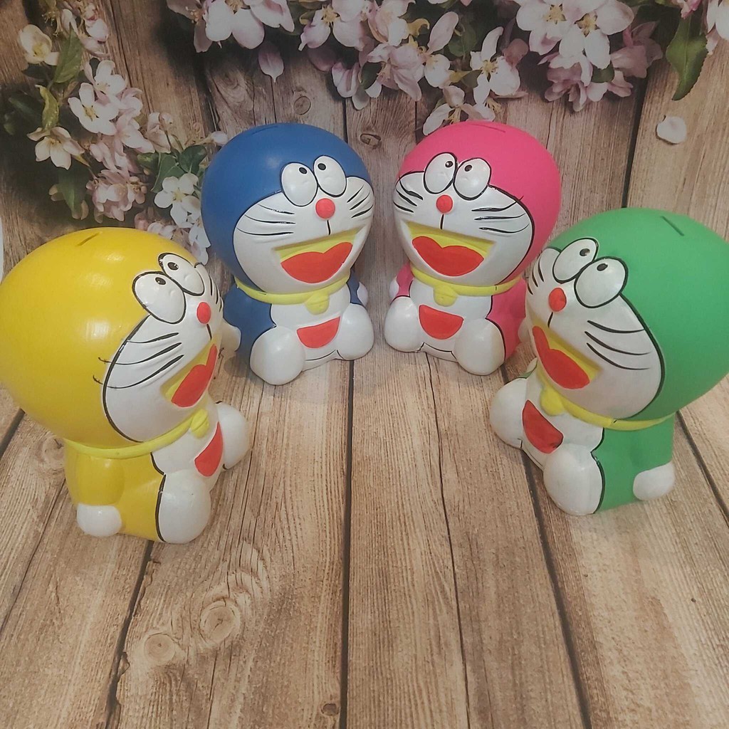 Heo Đất Tiết Kiệm mẫu DORAEMON cực HOT - Ống Heo làm quà tặng được trẻ em yêu thích – Ý nghĩa Giáo Dục tuyệt vời - 4 màu