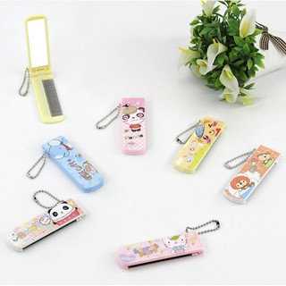 Móc khóa kèm gương lược 2 in 1 tiện dụng