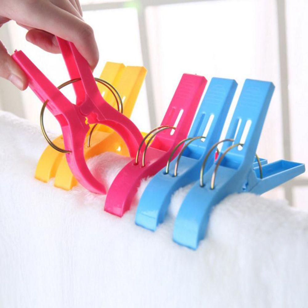 Bộ 4 Kẹp Nhựa Phơi Khăn Tắm / Vớ Tiện Dụng