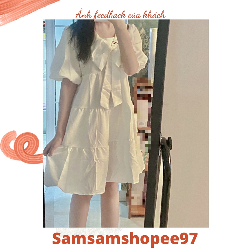 Váy babydoll trắng phối nơ nhẹ nhàng