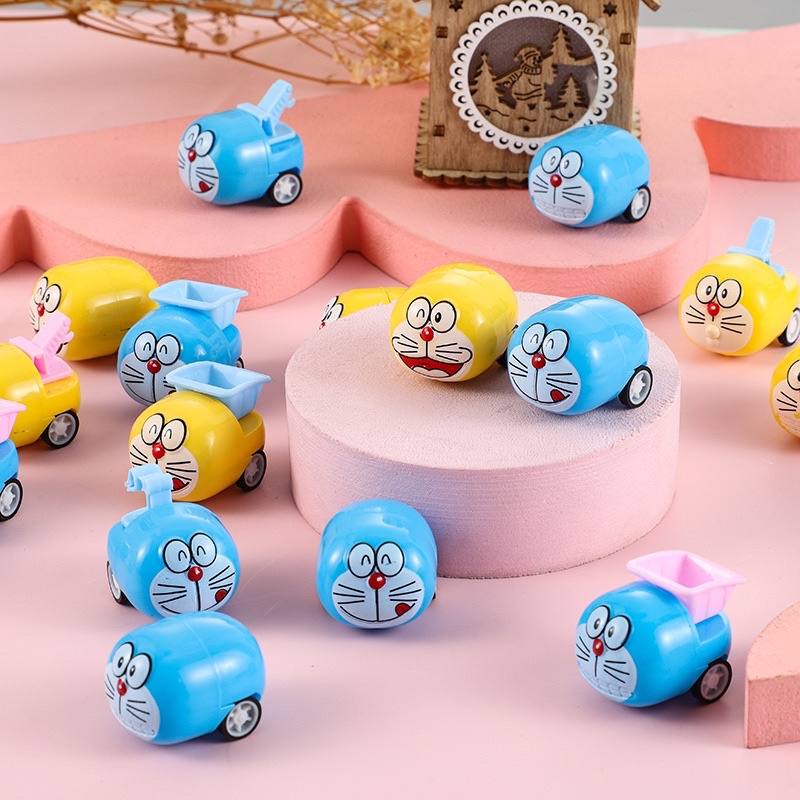 🍉Đồ Chơi Xe Bánh Đà Doraemon Mini 3*5cm DUASHOP.