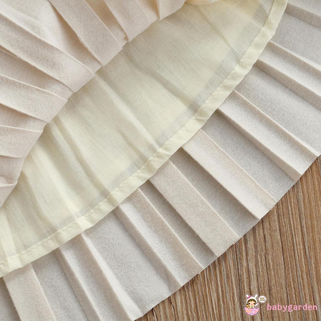 Chân váy da xếp ly lưng thun co giãn màu trơn dành cho bé gái