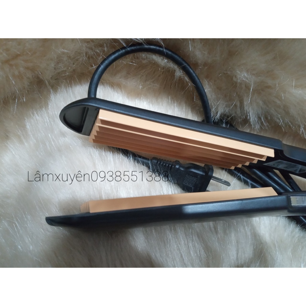 Máy bấm tóc CRA -203bấm tóc xù đẹp,mềm bóng đẹp với chất liệu thép titan giúp Máy bấm êm, nhanh, không rít tóc