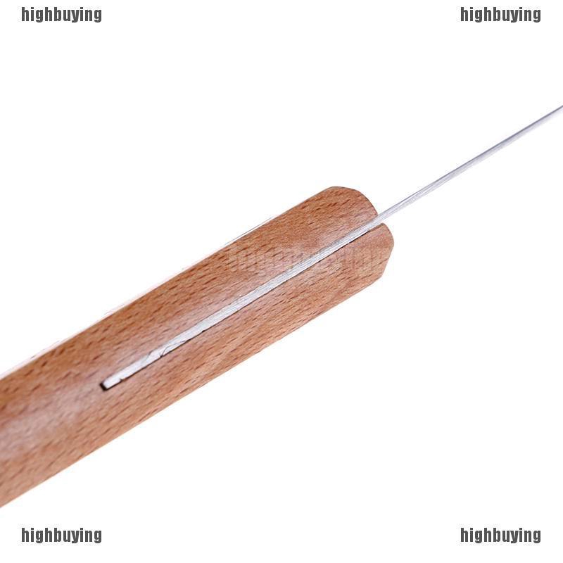 Dao nhỏ với cán gỗ và lưỡi inox dùng để cắt bơ tiện dụng