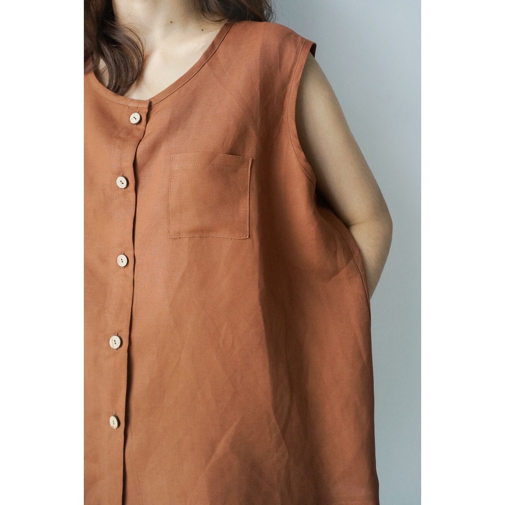 Áo sát nách hàng cúc trước