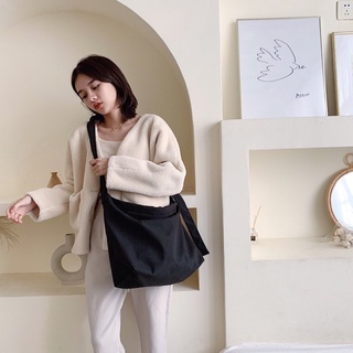 Túi đeo chéo dây rút vải canvas