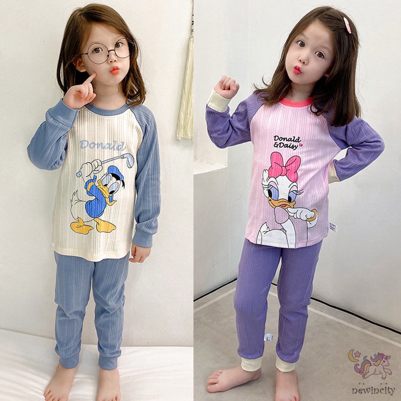 Bộ trang phục gồm áo và quần bó sát lưng cao họa tiết hoạt hình màu tươi sáng kiểu dáng Hàn Quốc thoải mái cho bé gái