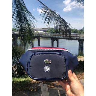 Túi Lacoste bao tử 2 ngăn viền đỏ - Din_vnxk