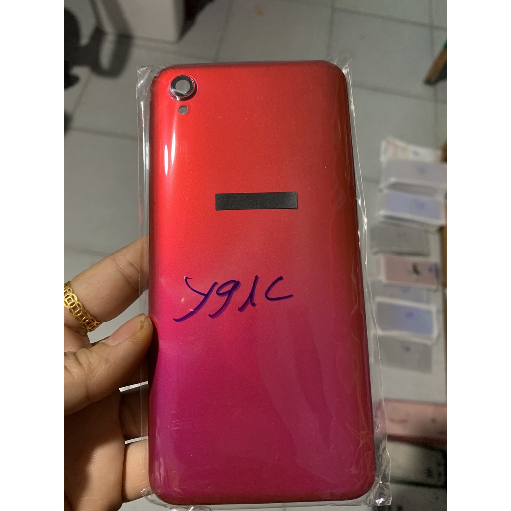 lưng y91c- vivo gồm: nút bấm , kính cam ( có khe sim)