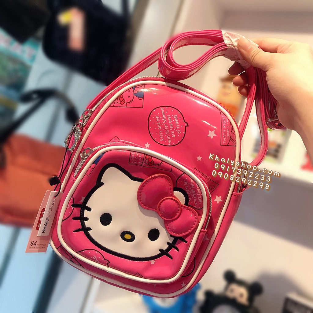 Túi đeo chéo hình Mèo Hello Kitty 2 ngăn da bóng màu hồng đậm siêu xinh cho bé gái - 72-HD1323 - (17x7x22cm)