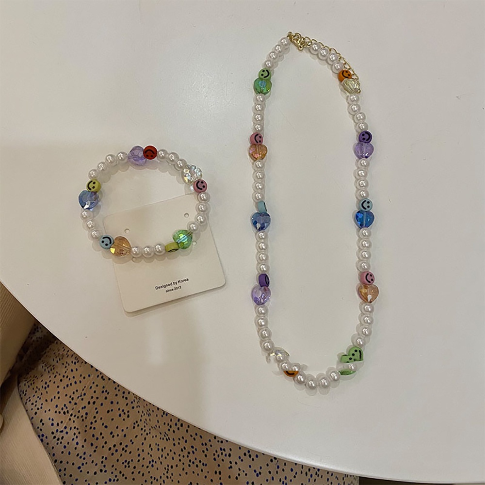 [Hàng mới về] Vòng cổ/ Vòng tay in hình mặt cười đính ngọc trai thiết kế thời trang Hàn Quốc cho nữ