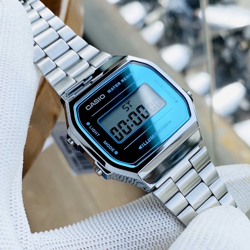 Đồng hồ điện tử nam nữ dây thép Casio A168 tráng gương mặt xanh