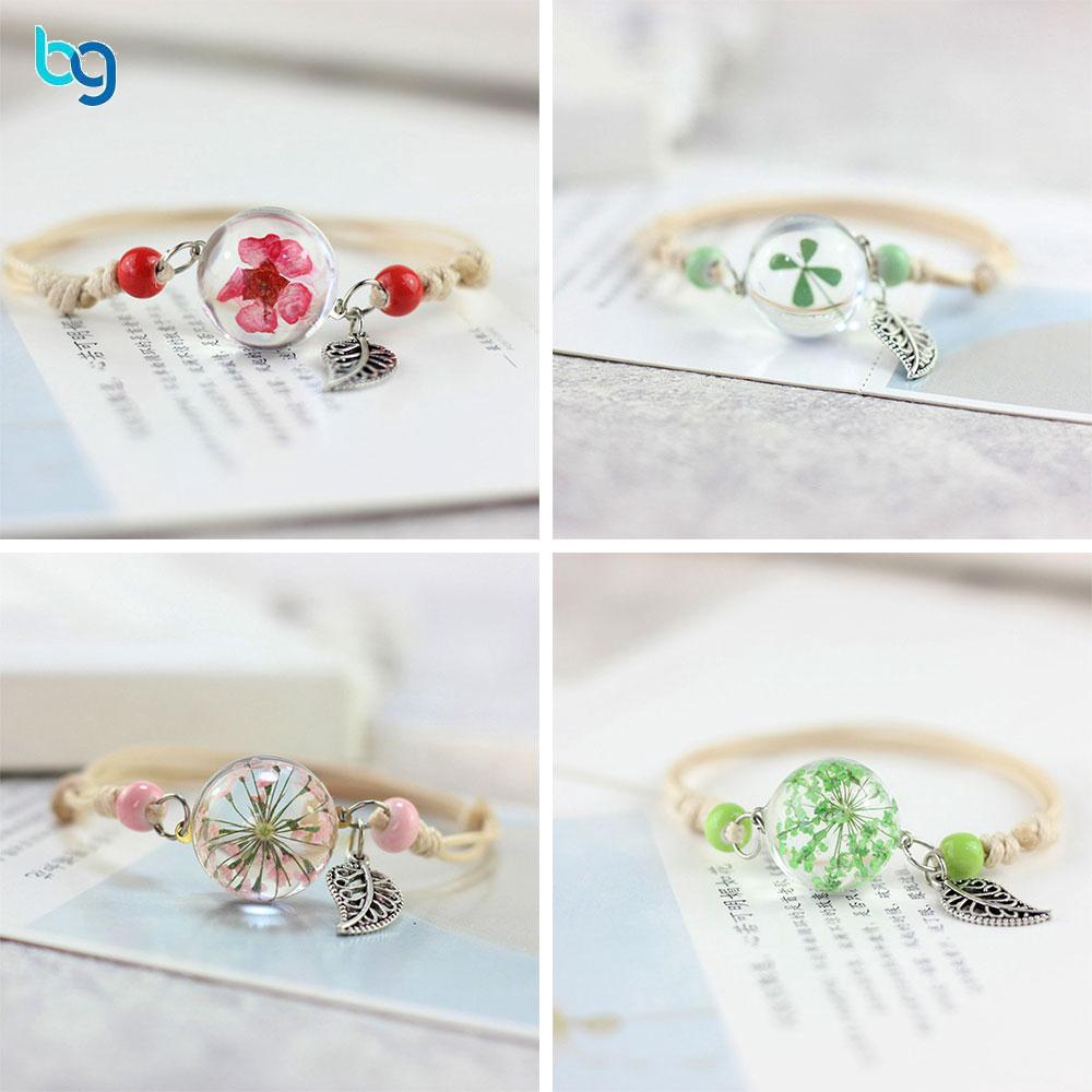 Vòng tay bện dây mặt hình quả bóng trong suốt phối hoa khô dễ thương cho nữ | BigBuy360 - bigbuy360.vn
