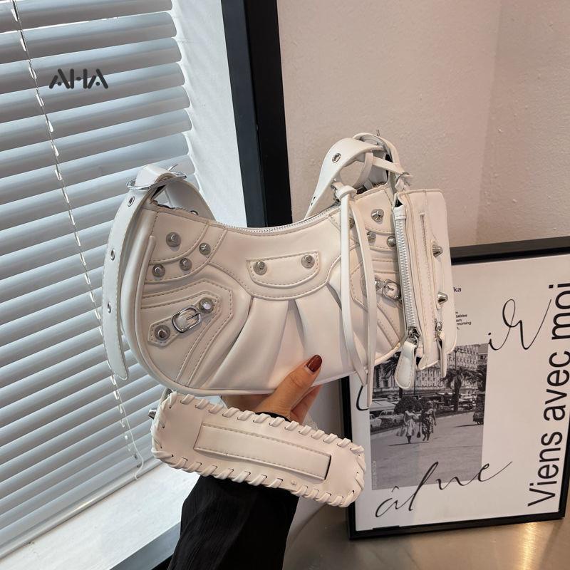 Túi xách AHA official đính đinh tán phong cách thời trang dành cho nữ