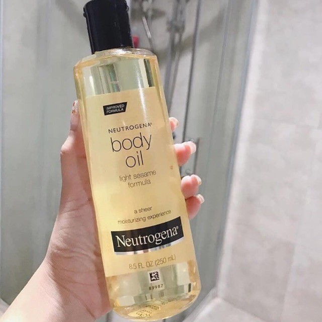 Dầu dưỡng toàn thân Body Oil Light Sesame Neutrogena 250ml