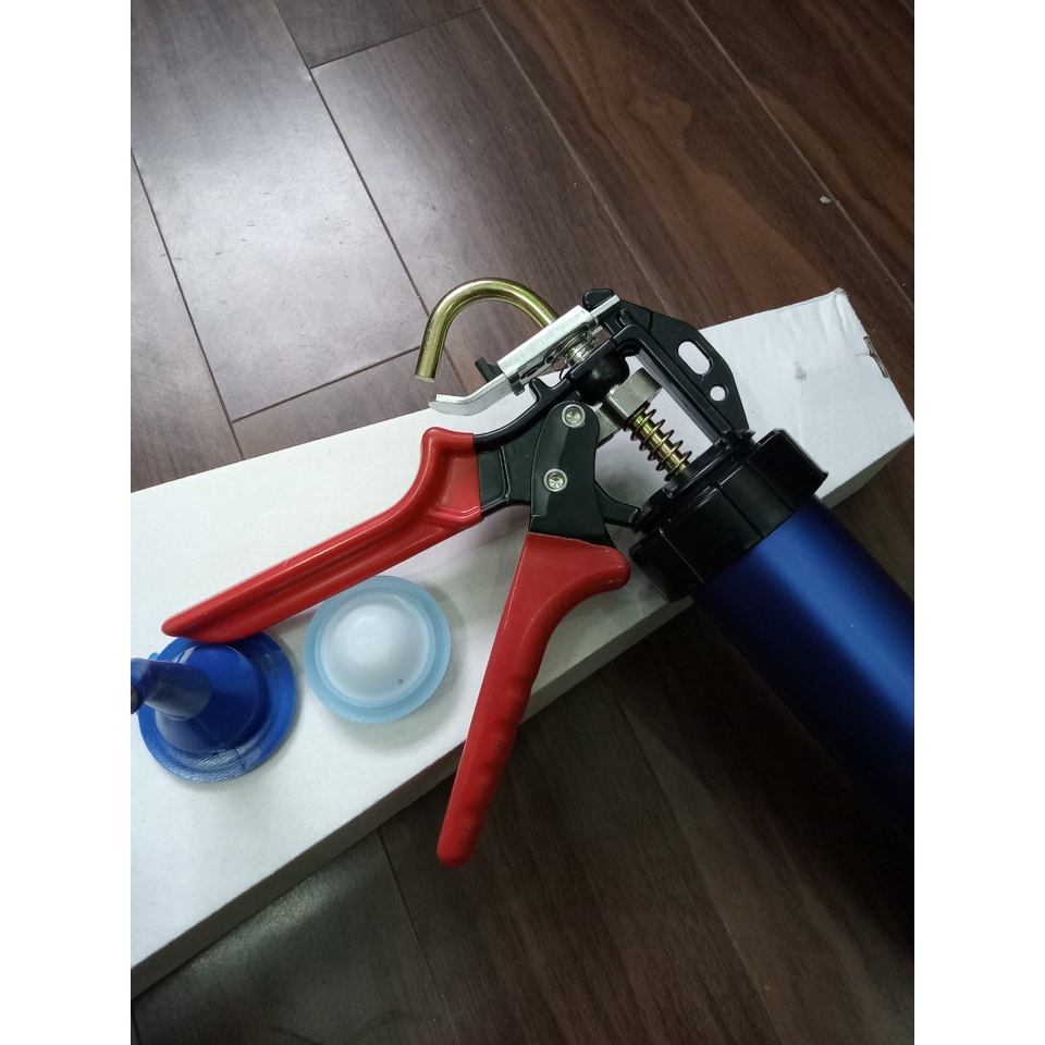 Súng bắn keo túi , súng băn keo xúc xích dạng nước 600ml. Kết hợp bắn keo lọ apolo đường keo dài, có chế độ tự ngắt
