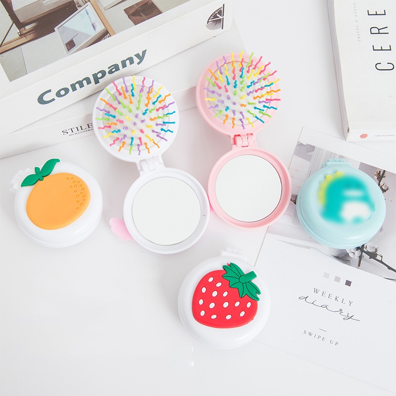 Gương mini cầm tay kèm lược massage