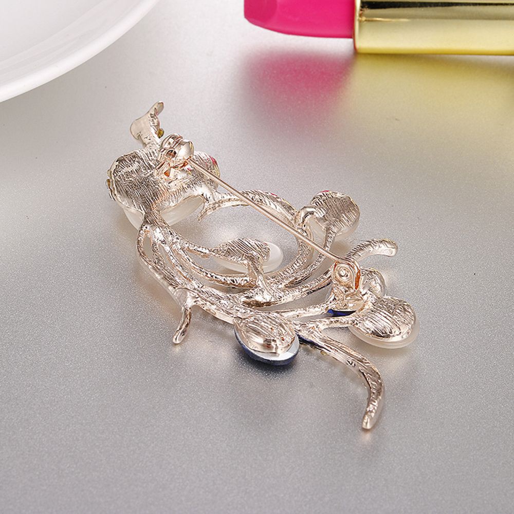 Ghim cài áo hình chim đính đá