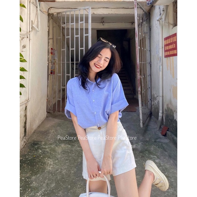 Áo sơ mi kẻ sọc tay gập cúc lưng xanh dương