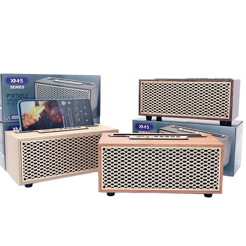 Loa bluetooth XM5, loa XM5 thùng gỗ , thiết kế cổ điển sang trọng ,có giá để điện thoại ,âm thanh cực hay.