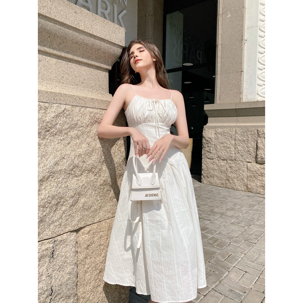 Đầm thiết kế SUNFLOWER màu trắng hai dây nhún nơ ngực xòe dài trẻ trung sang chảnh | 𝐉𝐔𝐋𝐈𝐄