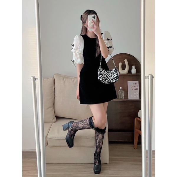 Váy nhung tay voan phồng đính nơ đen