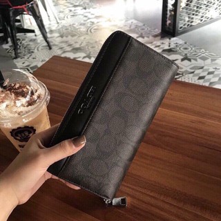 Ví cầm tay coach f25517 - size 20x10 coach ví dập logo hãng