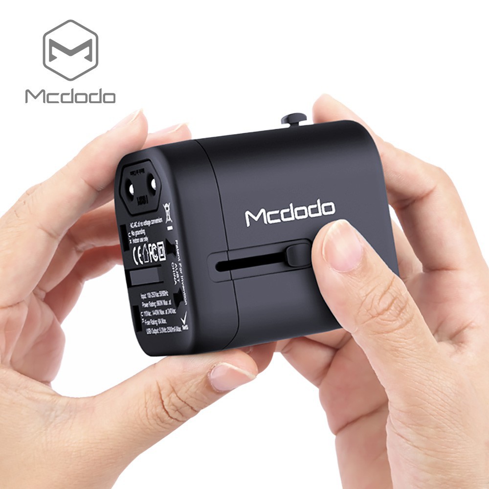 Củ sạc Mcdodo 2 cổng USB giắc cắm tiêu chuẩn EU UK US AU dành cho đi du lịch quốc tế