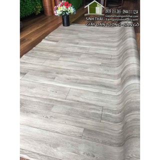 Simili trải sàn vân gỗ màu xám, mẫu mới ra, bề mặt có vân nhám như gỗ thật.