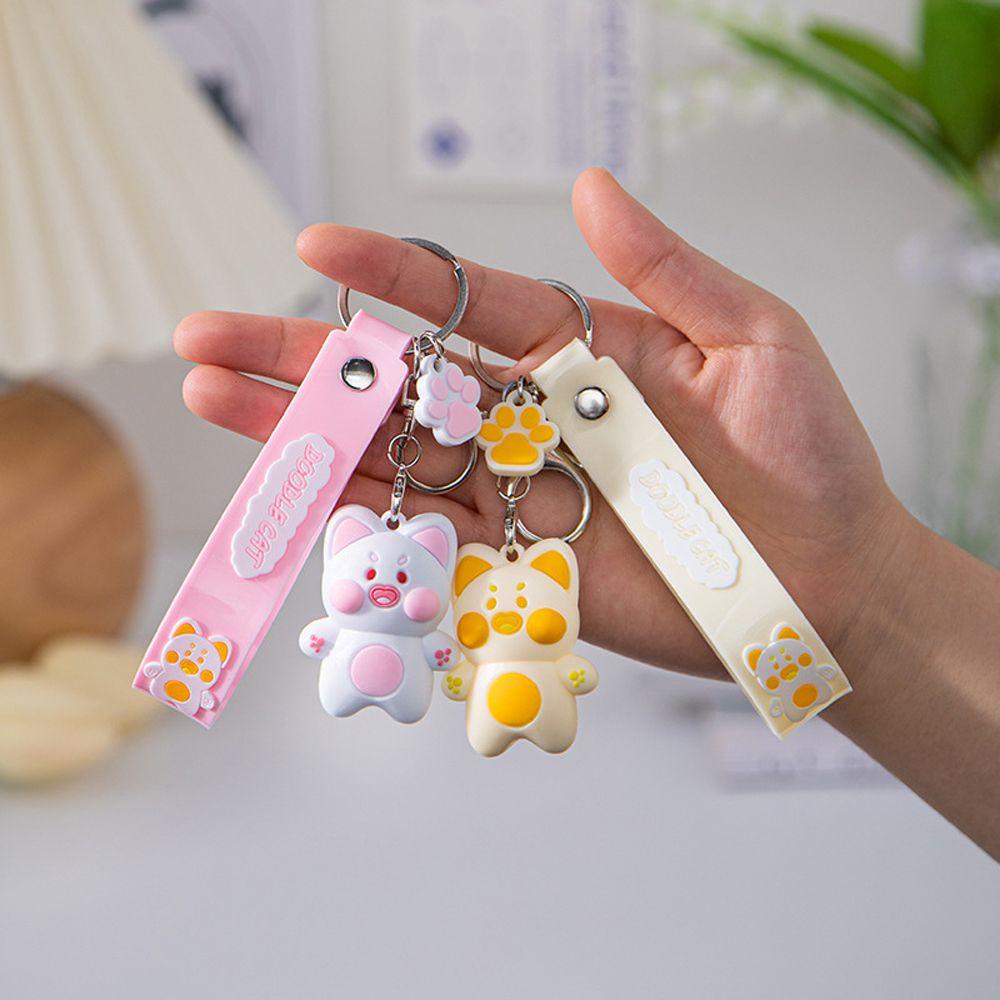 Móc Khóa Hình Mèo DuDu Độc Đáo Giá Đỡ