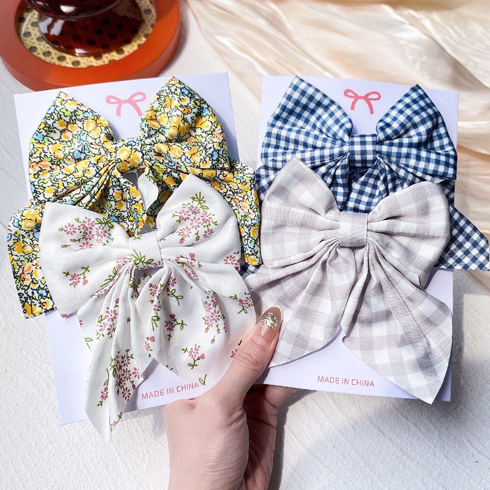 Set 2 kẹp tóc nơ lớn KIDSBOWS với họa tiết hoa phong cách Hàn Quốc cho nữ