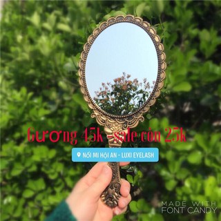 Gương cầm tay nữ hoàng