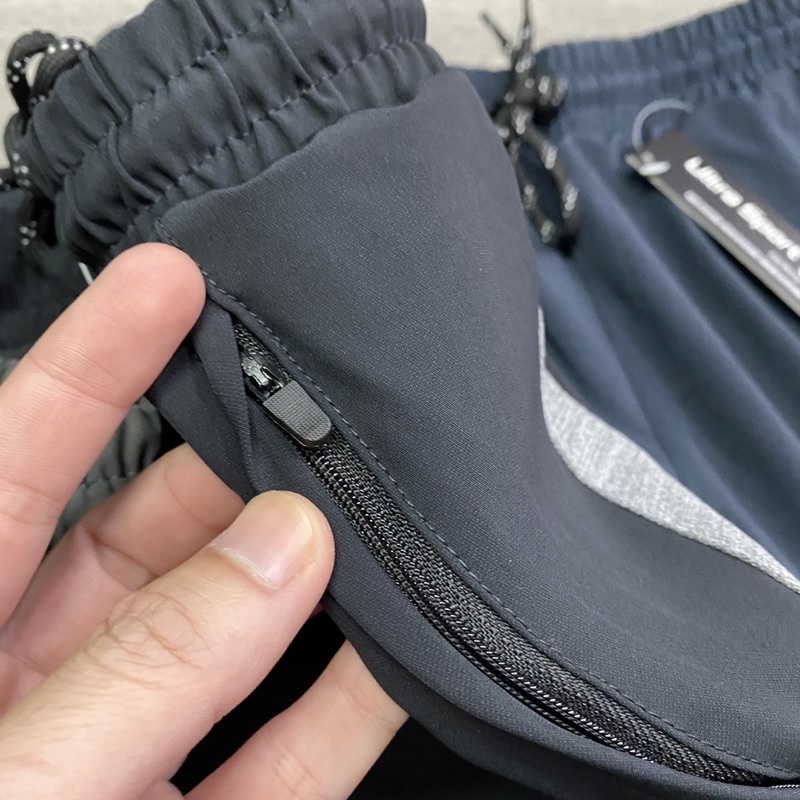 Quần gió xuất dư không nhăn/co giãn/chống nước nhẹ