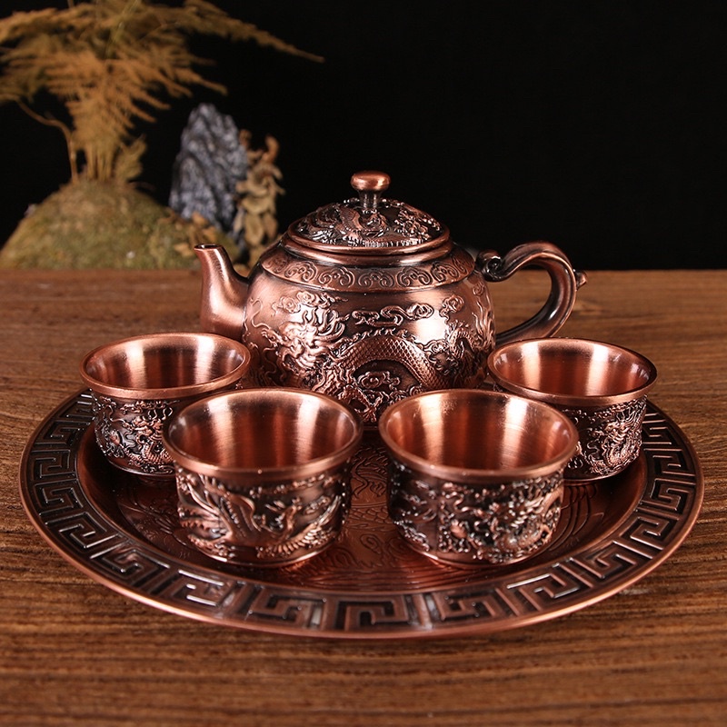 Bộ ấm chén uống trà Bộ ấm chén để đồ thờ bằng kim loại đồng hoa văn rồng phượng tinh xảo Huydecor