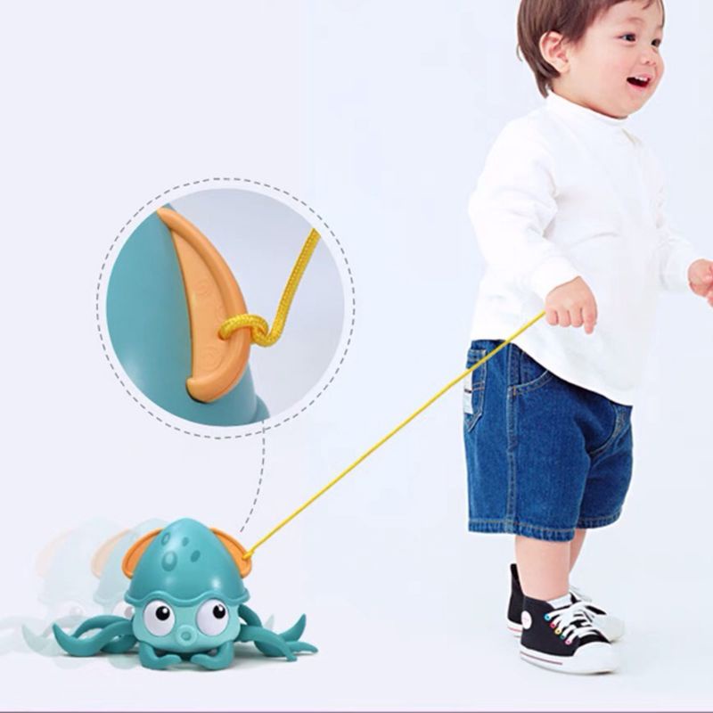Đồ Chơi Con Bạch Tuộc Bơi Dưới Nước Và Bò Trên Bờ Vặn Dây Cót